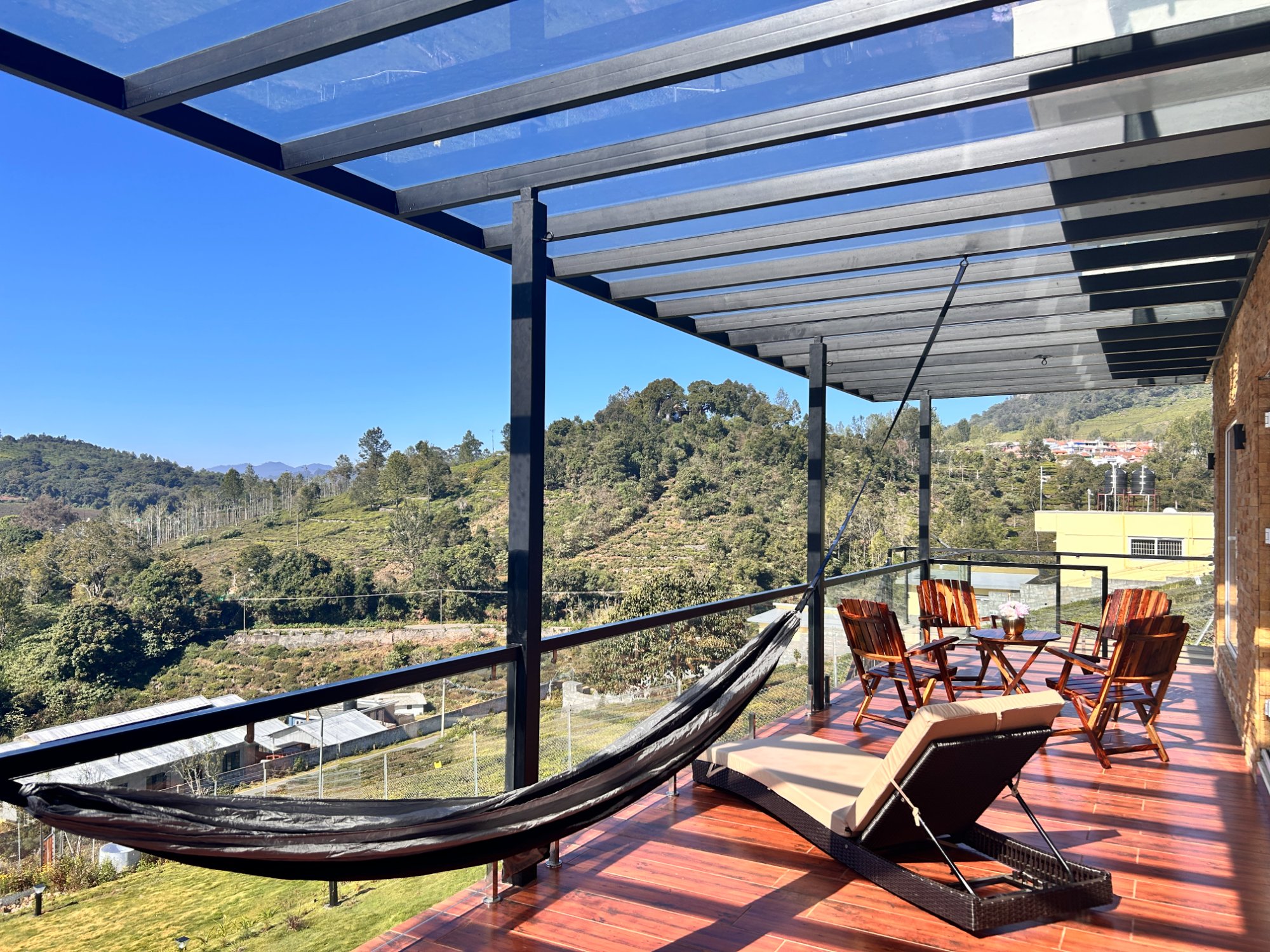 Terrace with hammock, sun lounger and mountain views